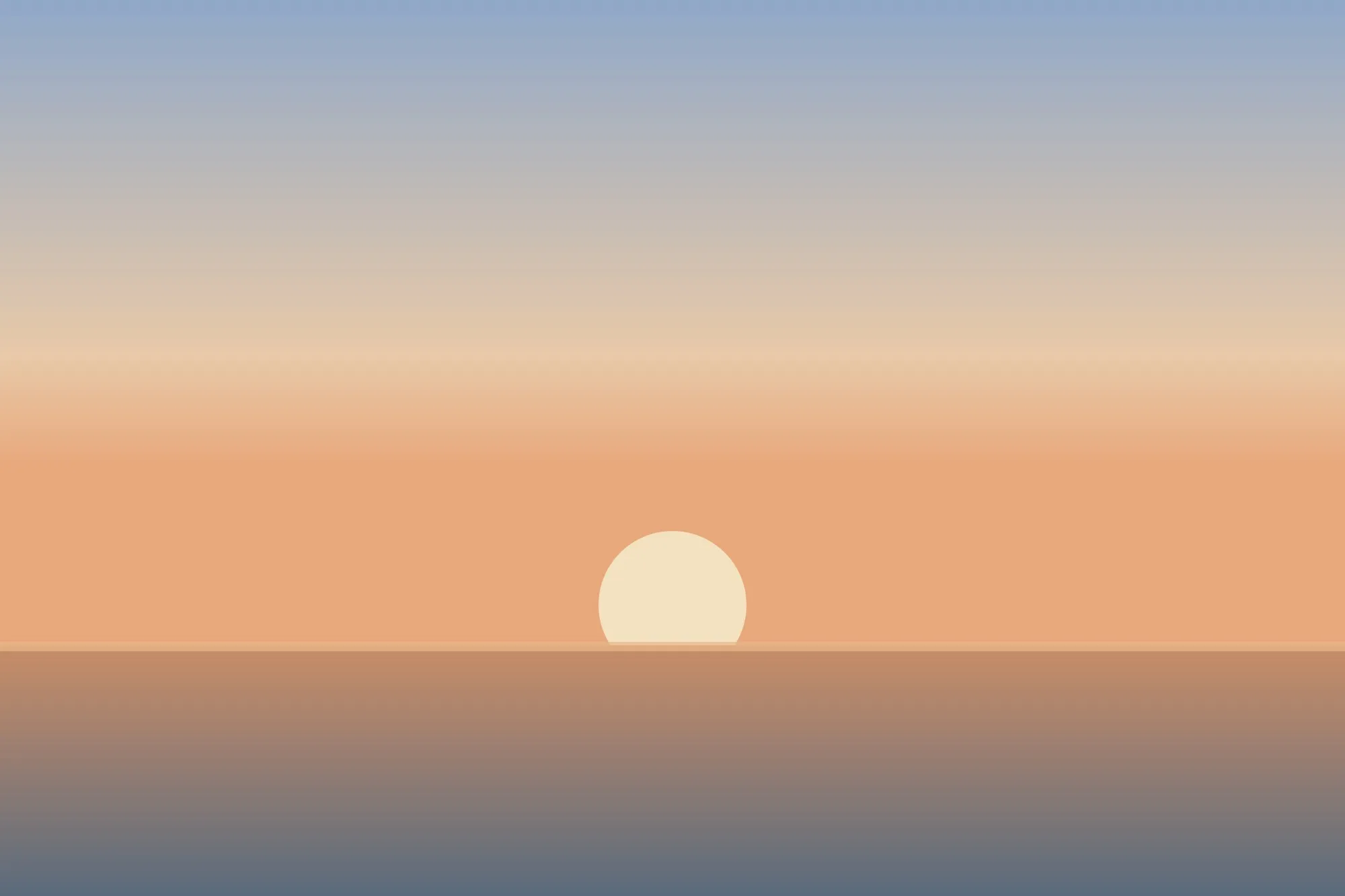 朝焼けの空と海に浮かぶ太陽